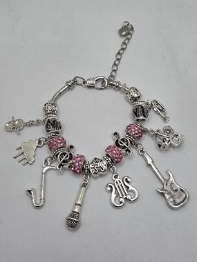 Silver Music Charm Bracelet with Pink Accents